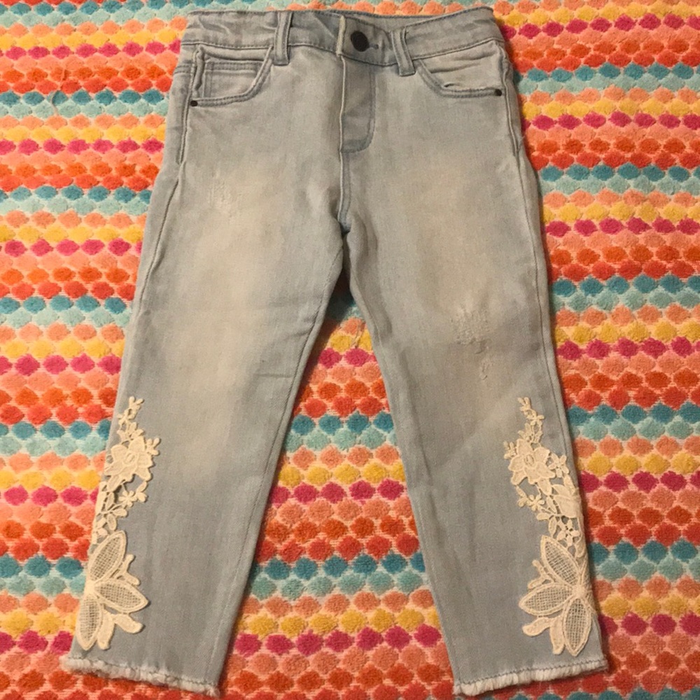 Jeans with embroidery on legs